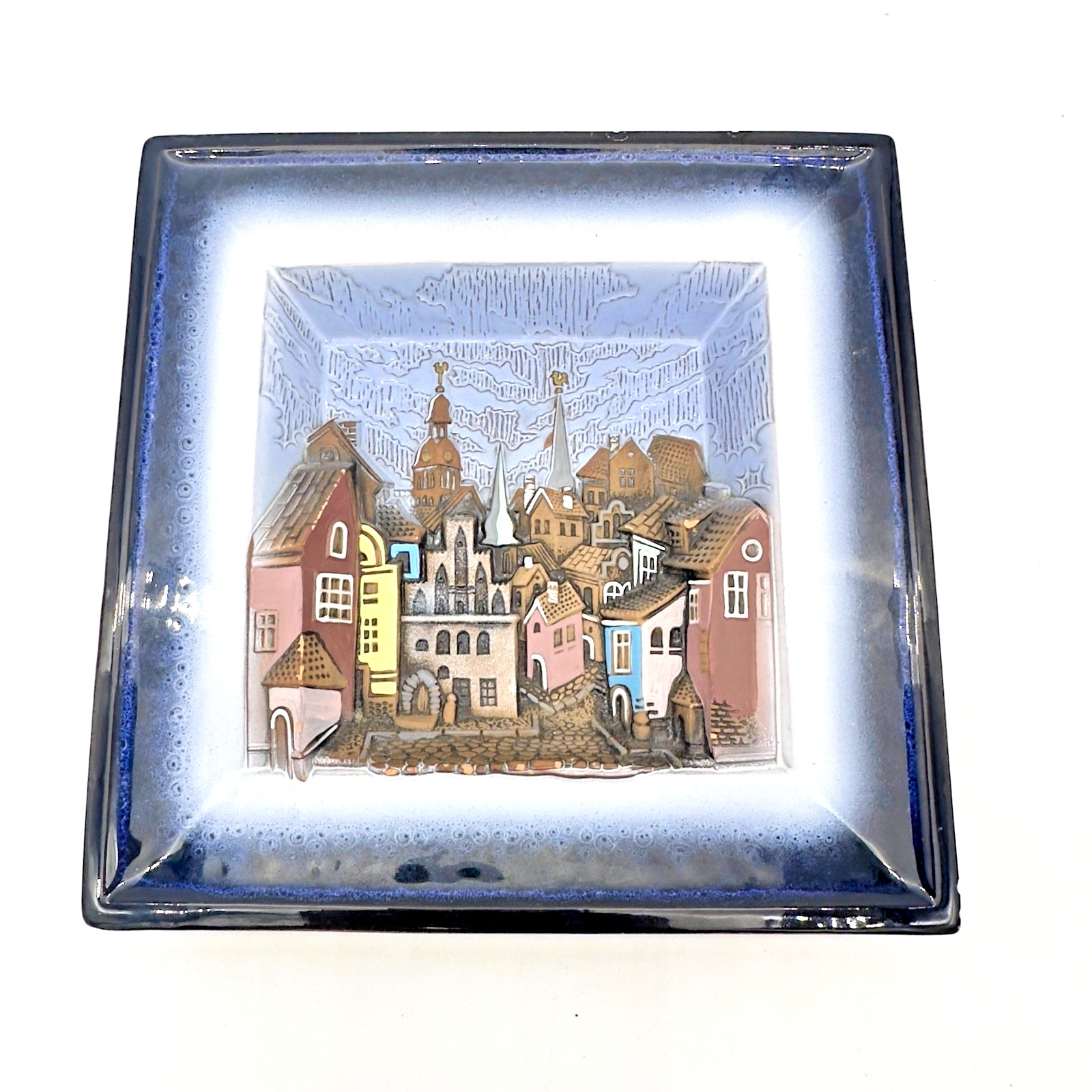 Vintage Latvian SIA “KLOTTE” Ceramic Wall Plaque • 3D Relief Town Scene • 8″ Sqr Vintage Latvian SIA “KLOTTE” Ceramic Wall Plaque • 3D Relief Town Scene • 8″ Sqr