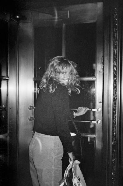 Actress Goldie Hawn enters the Sherry Netherland Hotel located at - Old Photo Actress Goldie Hawn enters the Sherry Netherland Hotel located at - Old Photo