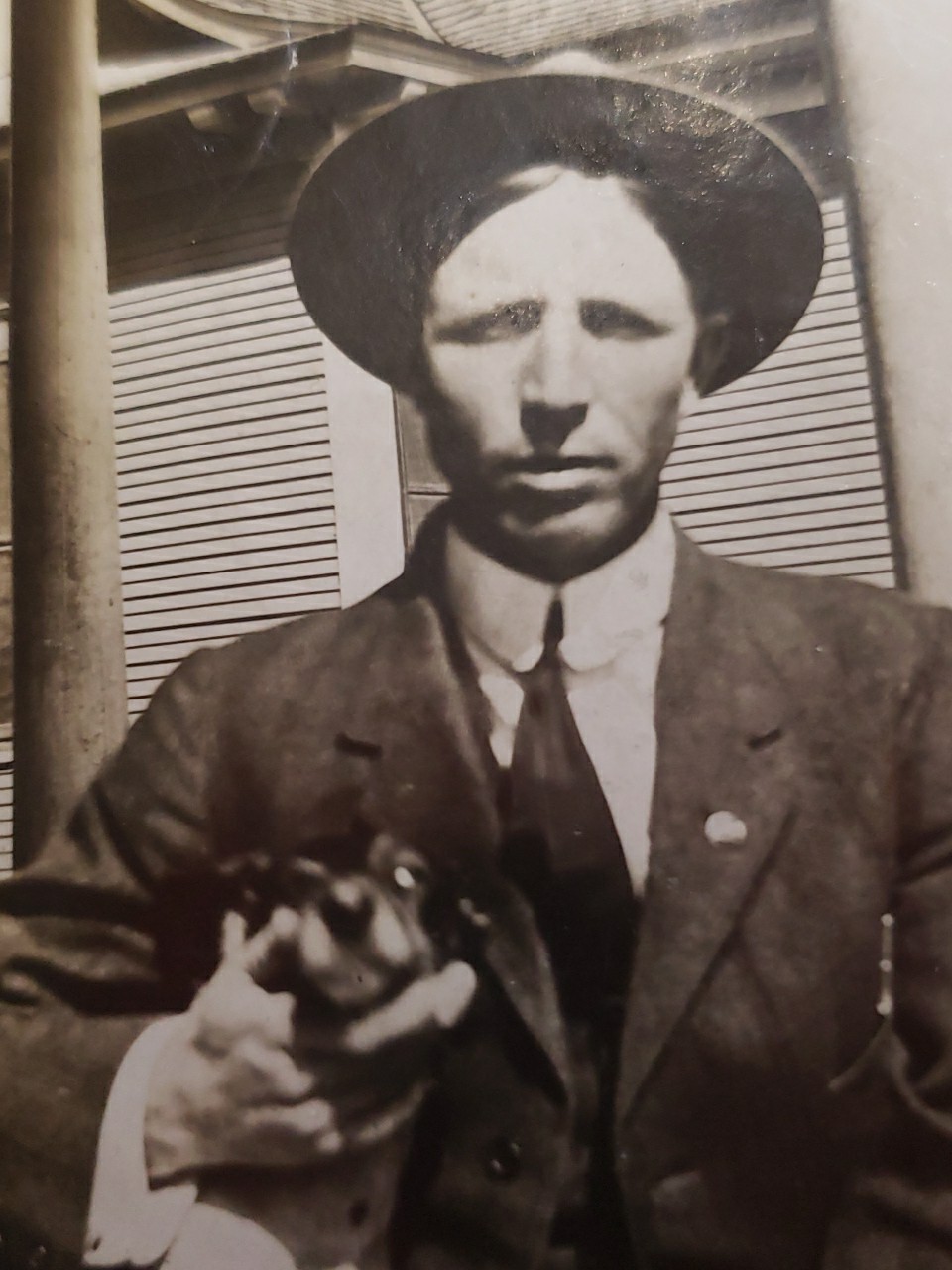 Antique 1900s Photo Man in Fedora Hat Holding Small Terrier Dog on Porch Card Mo