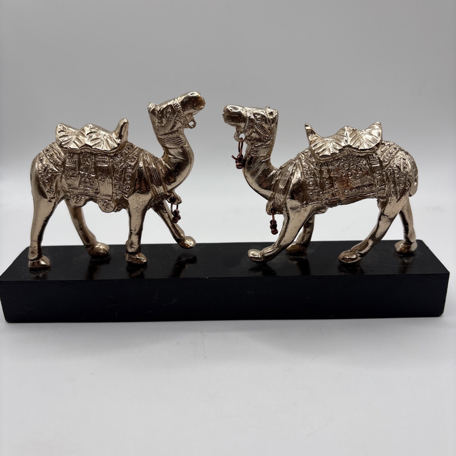 Vintage Brass Pair Of Camel Figurines On Wooden Black Base 4Hx8Lx1.5W Vintage Brass Pair Of Camel Figurines On Wooden Black Base 4Hx8Lx1.5W