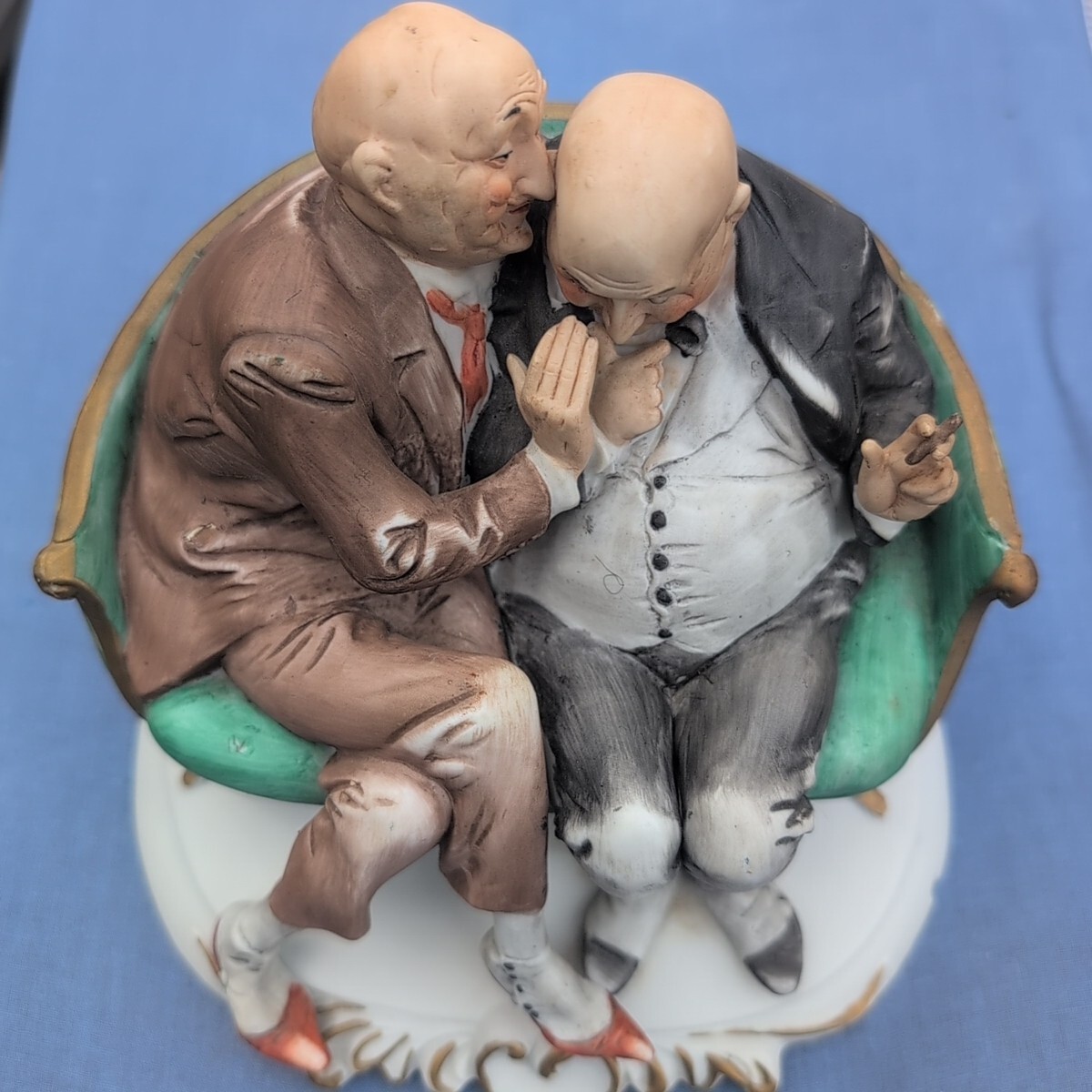 Reuge Musicbox playing 'memories', 2 old men sharing and chuckle Reuge Musicbox playing 'memories', 2 old men sharing and chuckle