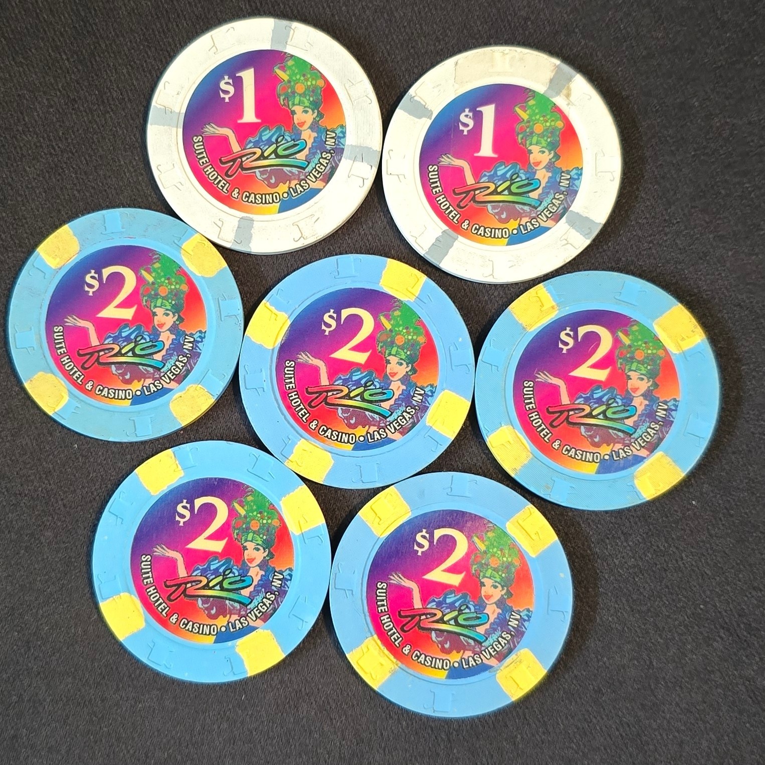 Vtg Rio Suite Hotel & Casino Las Vegas $1 and $2 Chips – Lot of 7 Carnival Logo Vtg Rio Suite Hotel & Casino Las Vegas $1 and $2 Chips – Lot of 7 Carnival Logo