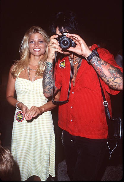 Donna D'Errico with Nikki Sixx of Motley Crue Ringling Bros Circus- Old Photo