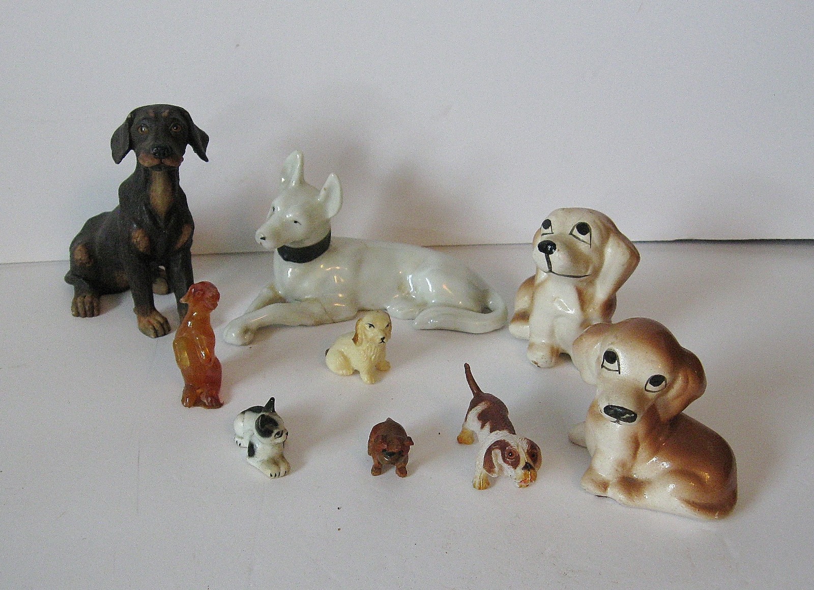 9 Pc Lot Miniature Dog Figurines Resin, Porcelain, Metal, China, etc.