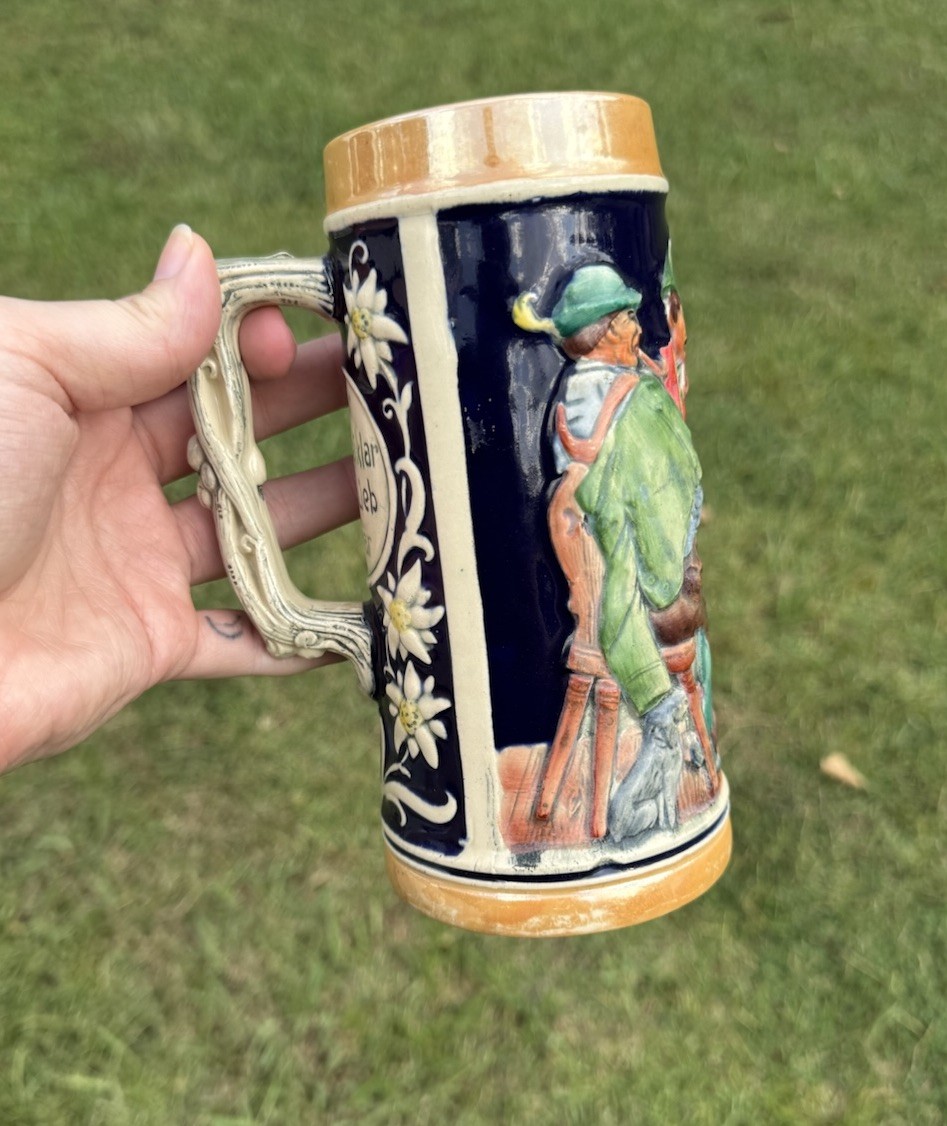 Vintage Colbalt Blue Beer Stein West Germany Woman Flowers Man Pipe 8.75\ Vintage Colbalt Blue Beer Stein West Germany Woman Flowers Man Pipe 8.75\