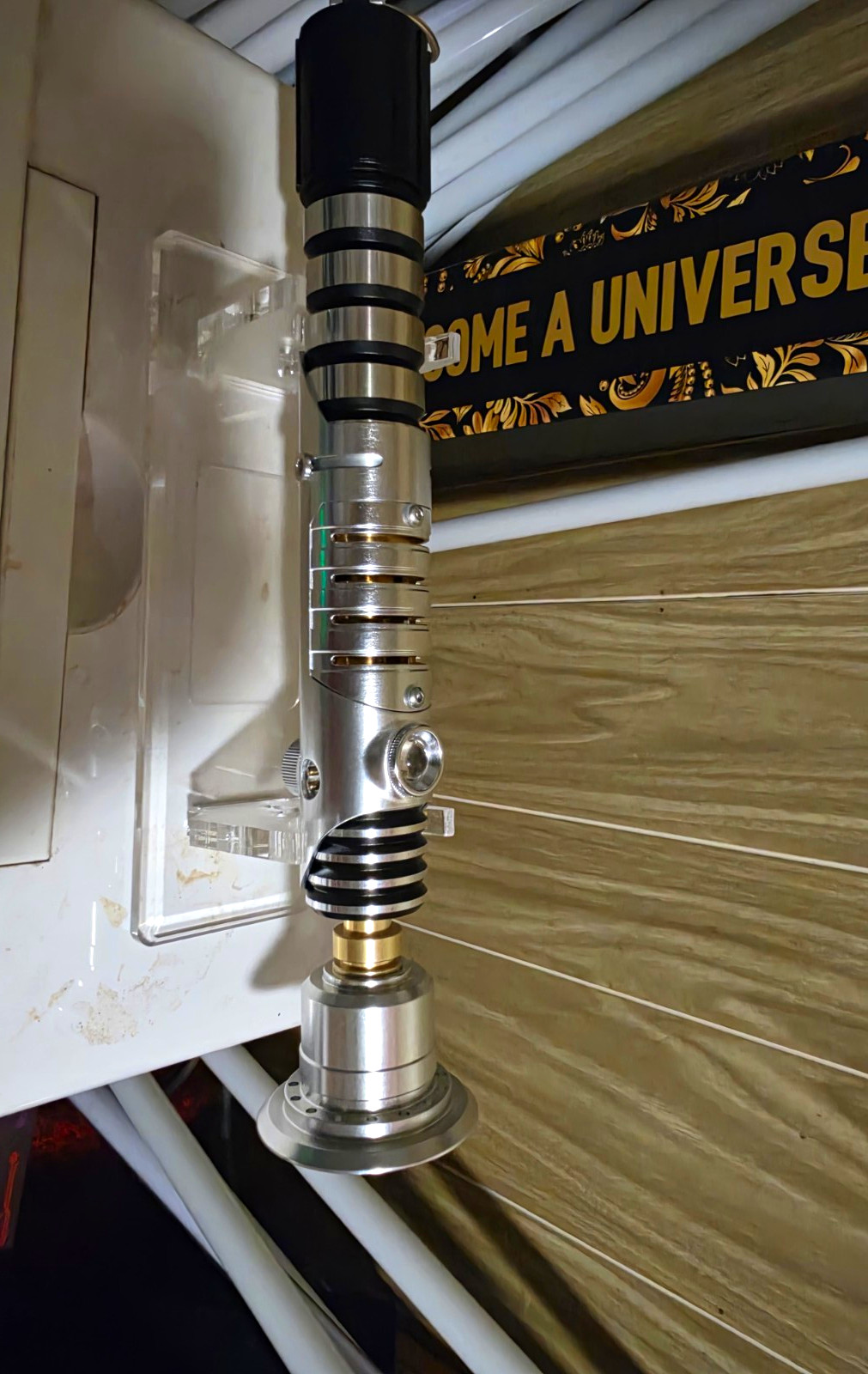 Star Wars Lightsaber Hilt Replica w/ Stand Silver/Black crystal spin chamber Star Wars Lightsaber Hilt Replica w/ Stand Silver/Black crystal spin chamber