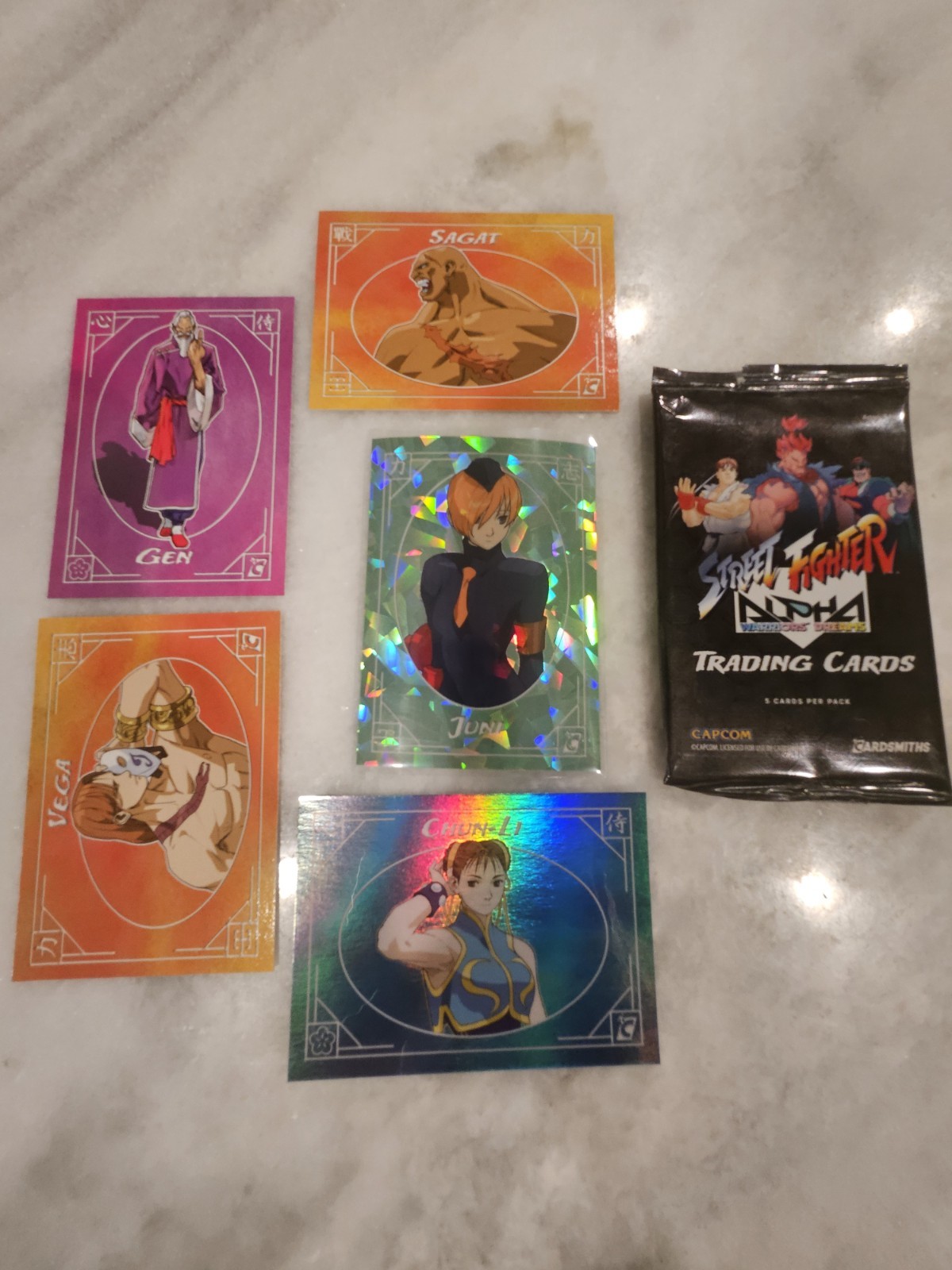 2025 Cardsmiths Street Fighter Alpha Juni #23 Jade /45 Gemstone Refractor + PACK