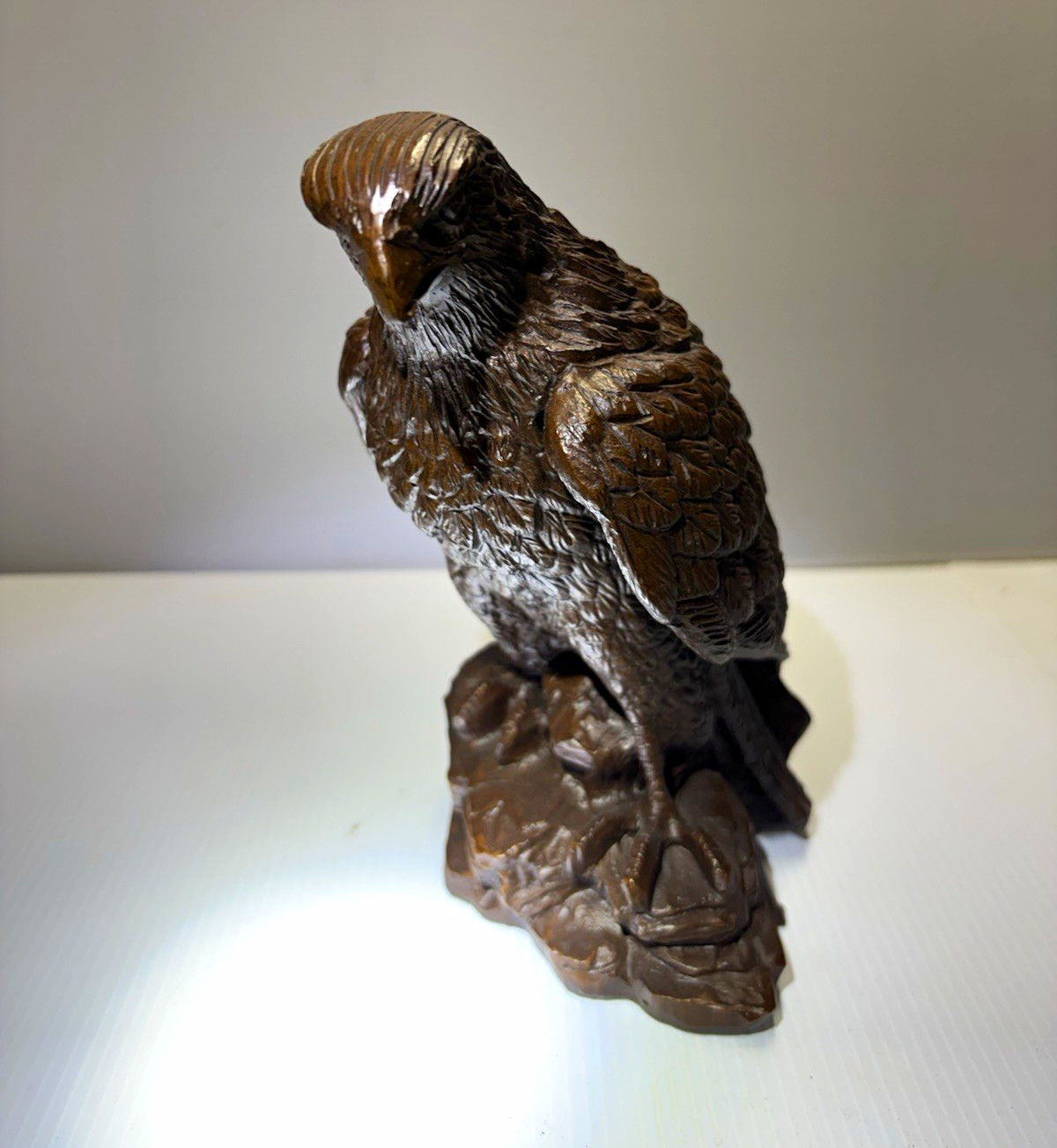 Eagle or Hawk Bird of Prey Figurine Sculpture on Rock Base in Brown