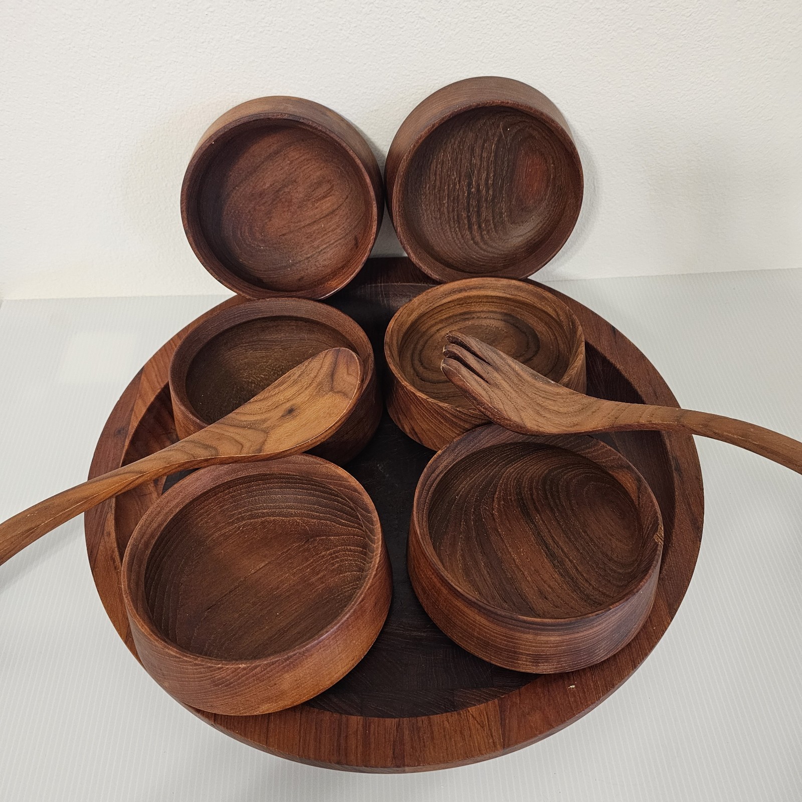 DANSK DESIGNS DENMARK IHQ SET, 6 BOWLS, TONGS, SLANTED CUTTING BOARD TEAK WOOD DANSK DESIGNS DENMARK IHQ SET, 6 BOWLS, TONGS, SLANTED CUTTING BOARD TEAK WOOD