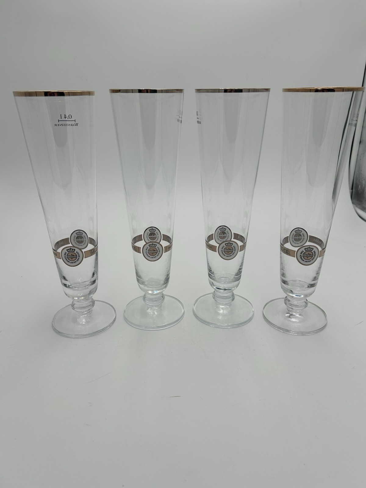 Warsteiner German Beer Glasses Footed Pilsner Gold Rim .4L Set Of 4 Barware Warsteiner German Beer Glasses Footed Pilsner Gold Rim .4L Set Of 4 Barware