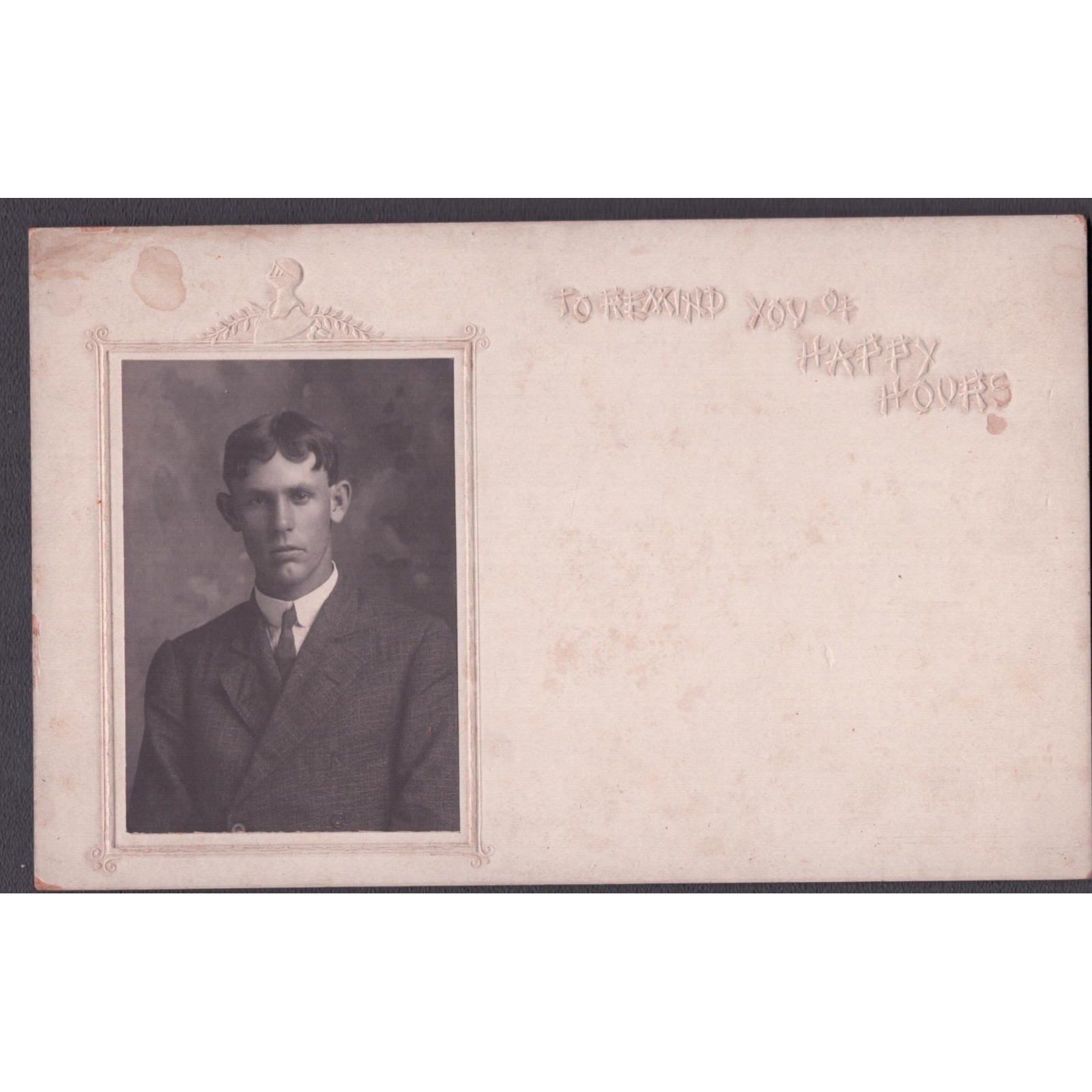 Antique RPPC Young Man Studio Portrait Embossed Happy Hours Frame Undivided Back