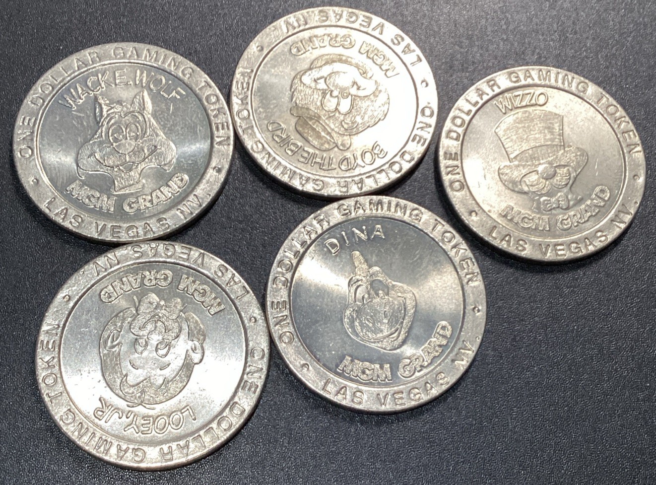 MGM Grand Las Vegas One Dollar Token Lot-1993 Set Of 5- Characters MGM Grand Las Vegas One Dollar Token Lot-1993 Set Of 5- Characters