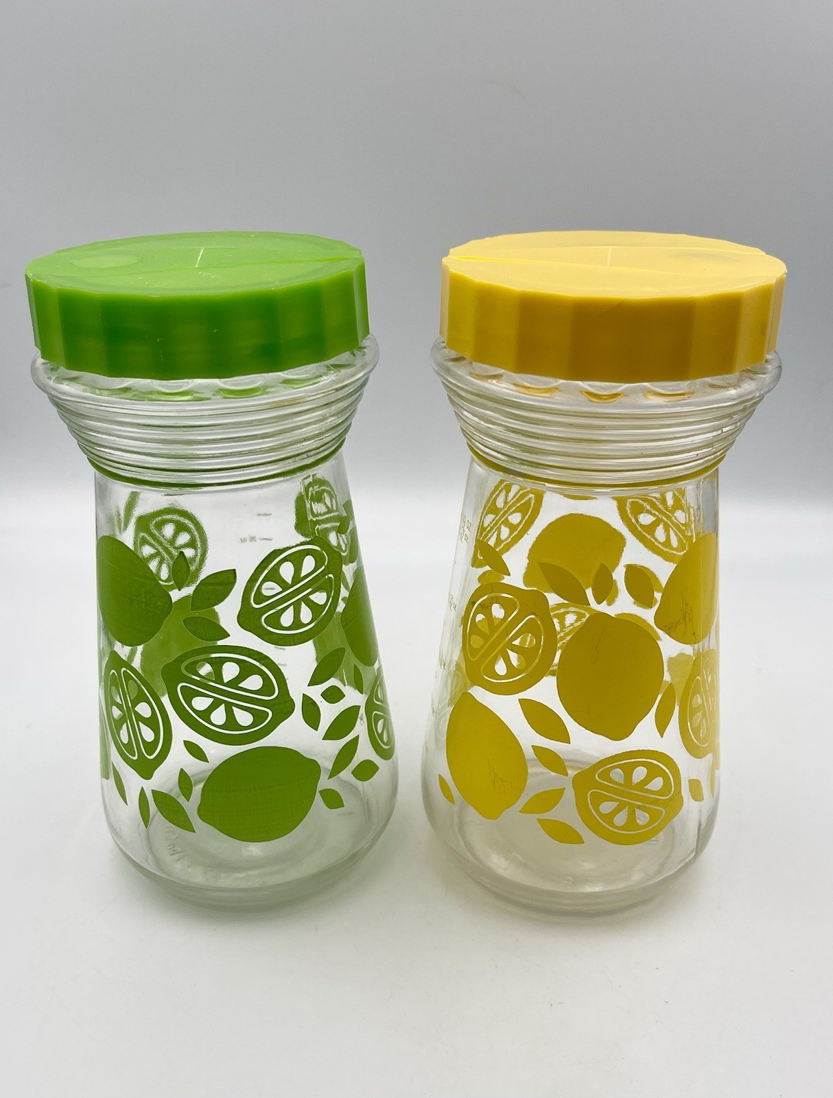 Vintage 1970s Lemon Glass Measuring Jars Green Yellow Pour Spout Lids Set 2