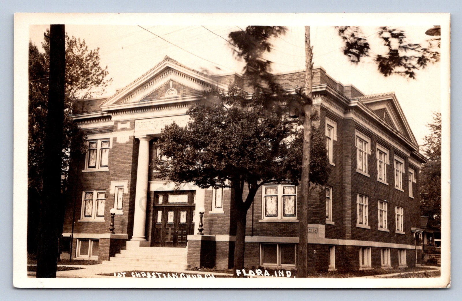 K3/ Flora Indiana RPPC Postcard c1920s First Christian Church  198