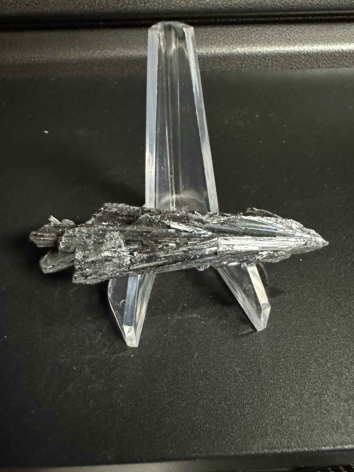 7915 RARE Gorgeous Shiny Stibnite .8”TH 3.3”L 1 Oz. Stand Not Included 7915 RARE Gorgeous Shiny Stibnite .8”TH 3.3”L 1 Oz. Stand Not Included