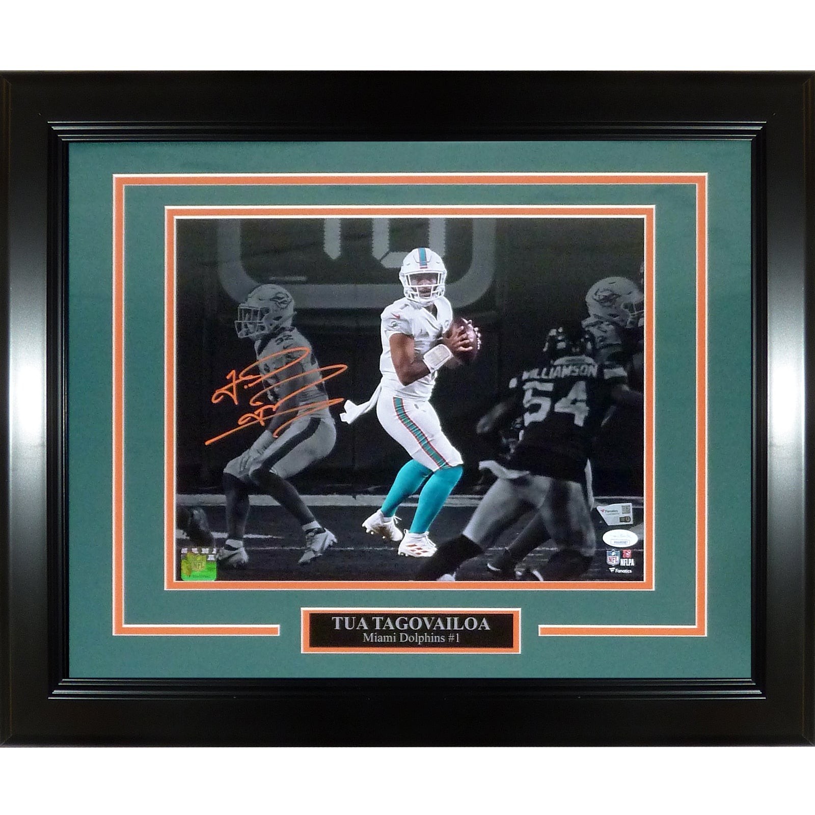 Tua Tagovailoa Autographed Miami Dolphins (Spotlight) Deluxe Framed 11x14 Photo Tua Tagovailoa Autographed Miami Dolphins (Spotlight) Deluxe Framed 11x14 Photo