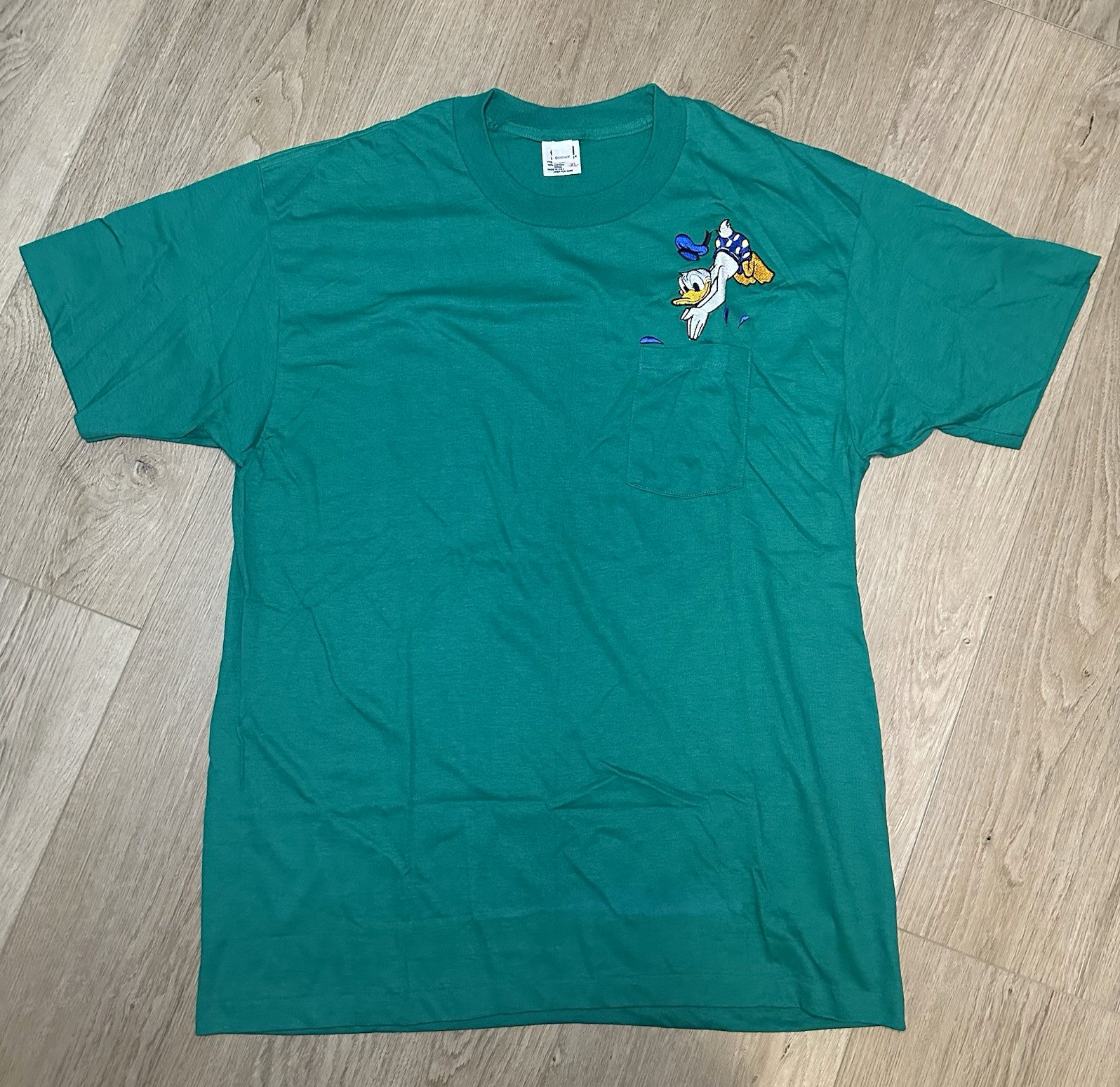 Vtg 90s Disney Donald Duck Pocket T Shirt Green Embroidered Anvil Red Bar XL Vtg 90s Disney Donald Duck Pocket T Shirt Green Embroidered Anvil Red Bar XL