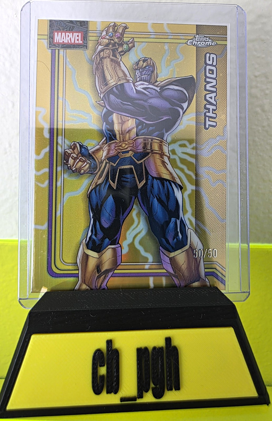 Topps 2026 Chrome Marvel Thanos #174 Gold Lightning Refractor 50/50 BOOKEND Topps 2026 Chrome Marvel Thanos #174 Gold Lightning Refractor 50/50 BOOKEND