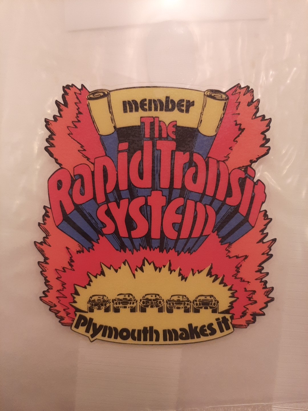 Vintage Plymouth Rapid Transit System Member Sticks Inside The Glass.