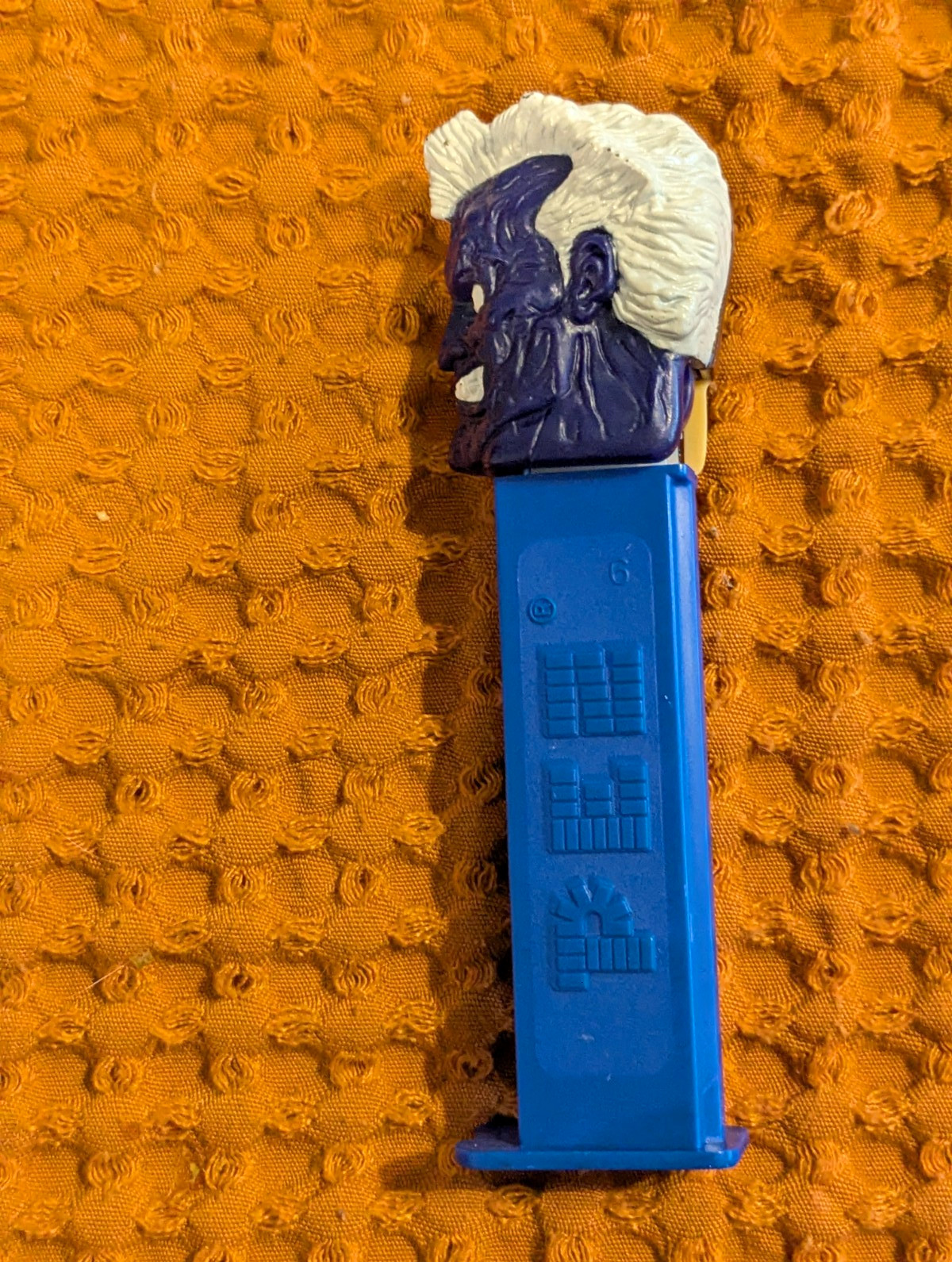 Vintage PEZ Dispenser No Feet Blue Stem Character Head White Hair Purple Face