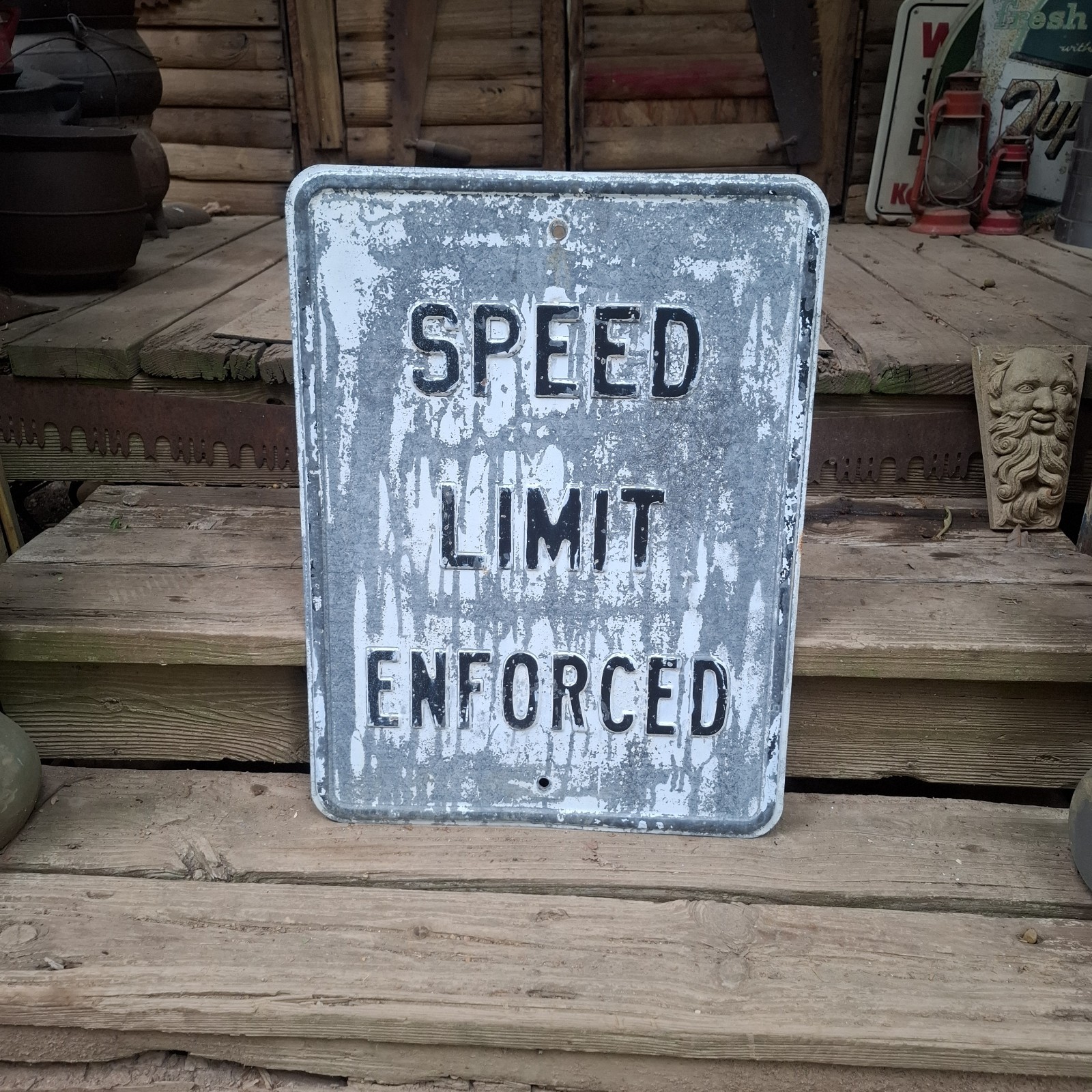 Vintage heavy metal embossed speed limit enforced street sign