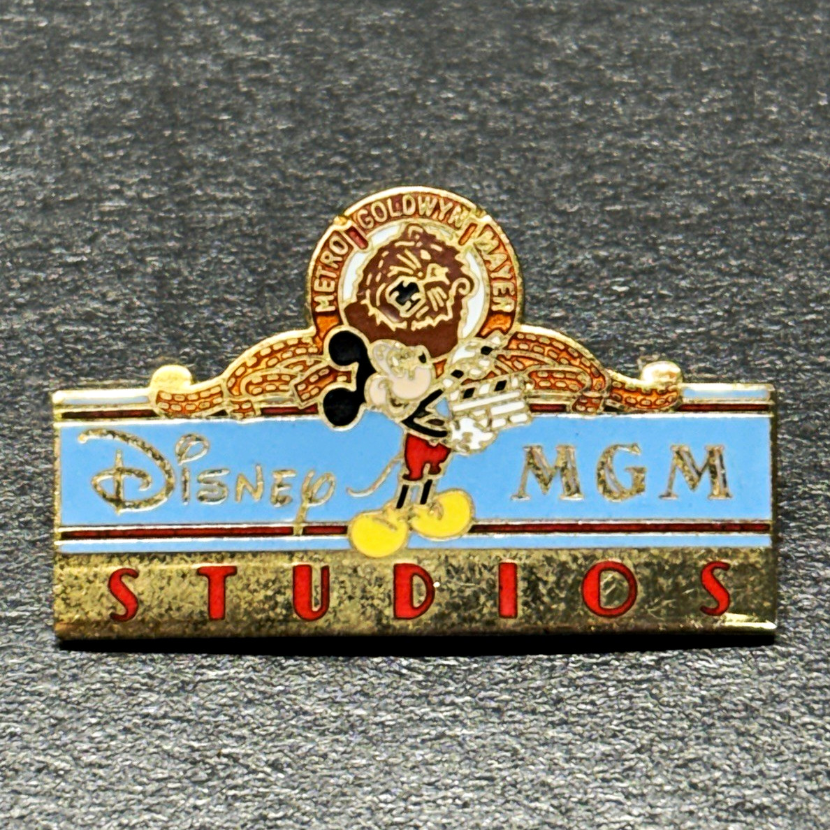 Disney MGM Studios Mickey Mouse Metro Goldwyn Mayer Single Pinback Pin Disney MGM Studios Mickey Mouse Metro Goldwyn Mayer Single Pinback Pin