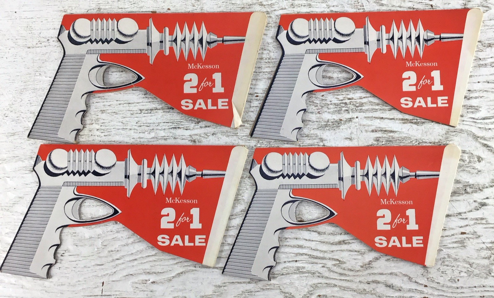 4 Vintage Promotional Carboard Ray Gun McKesson 2 For 1 Sale advertising display 4 Vintage Promotional Carboard Ray Gun McKesson 2 For 1 Sale advertising display