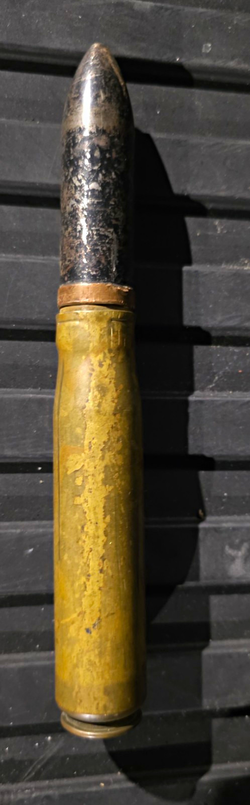 Vintage Brass Non live bullet for machine gun or tank gun. Nice and heavy.