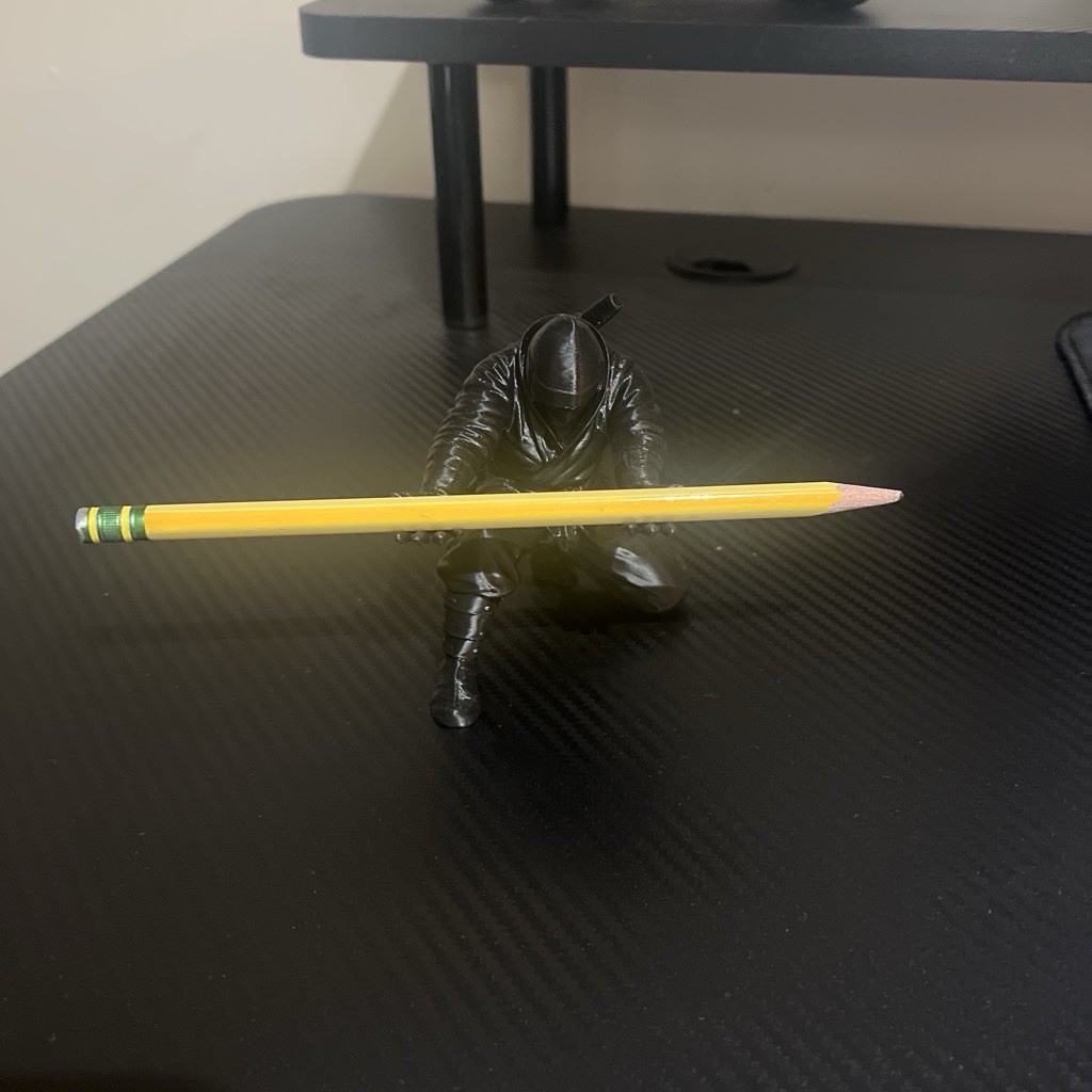 Black ninja pen holder with textured, wavy lines #ninja #stationery