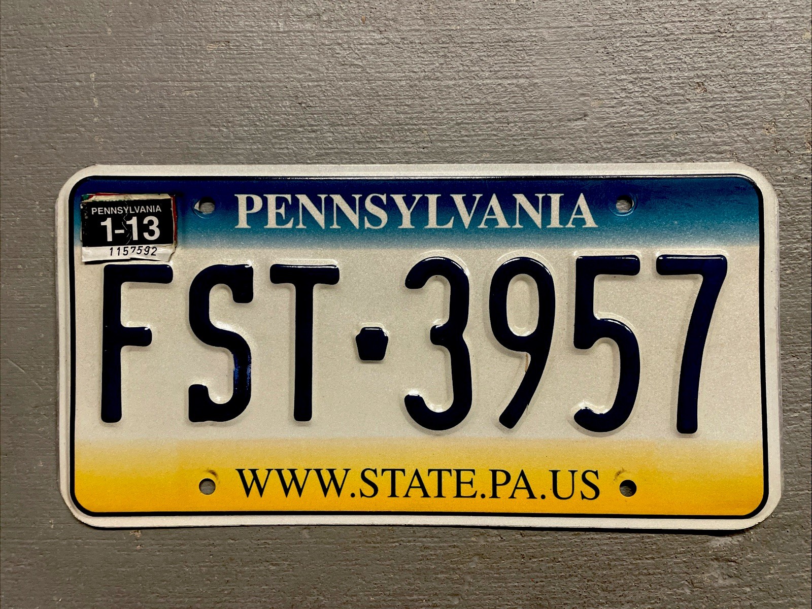 ONE PENNSYLVANIA LICENSE PLATE FADE STYLE RANDOM LETTERS/NUMBERS GOOD/FAIR COND.