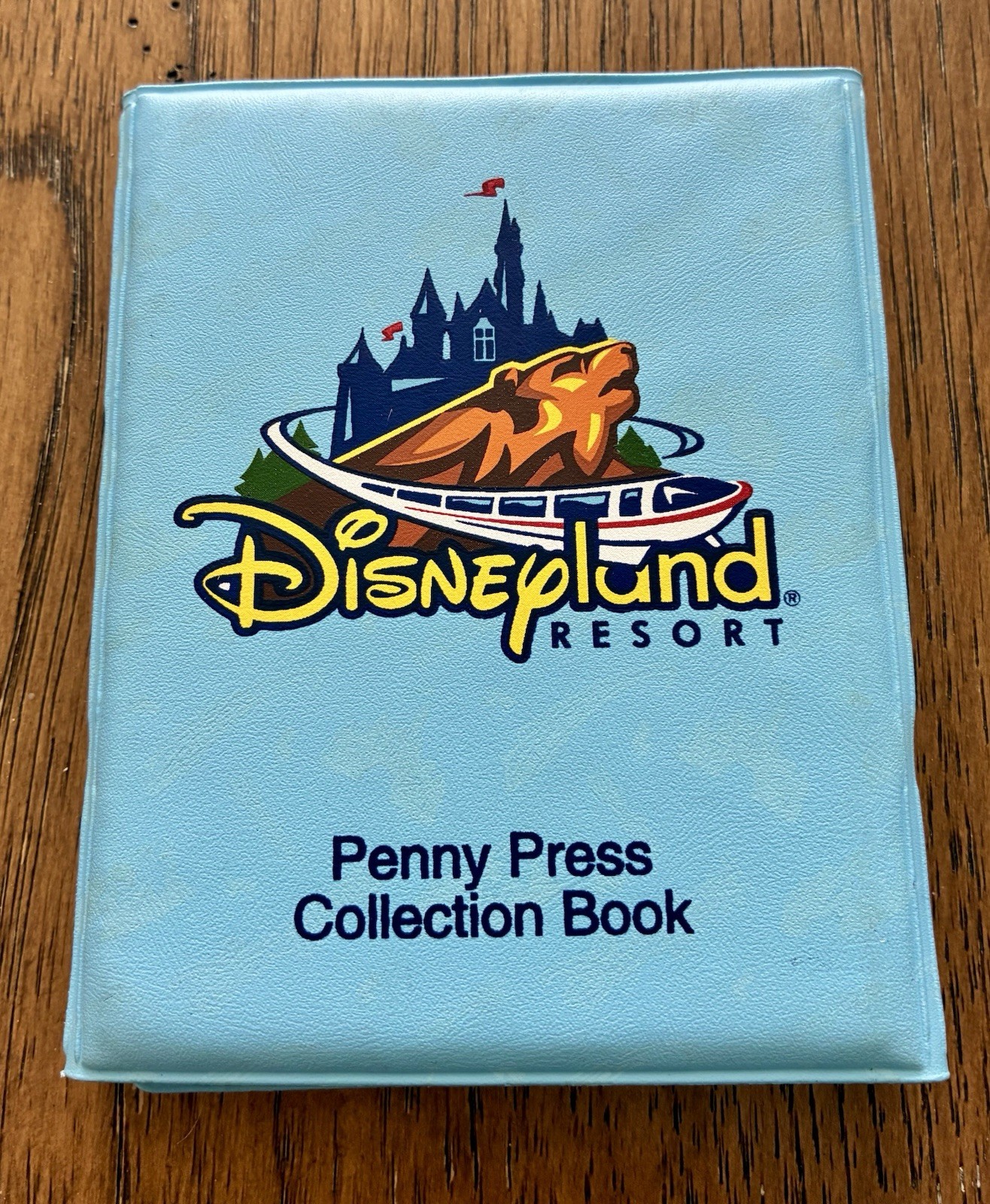 Disneyland Pressed Penny Book and Collection of 34 Pressed pennies And Quarters