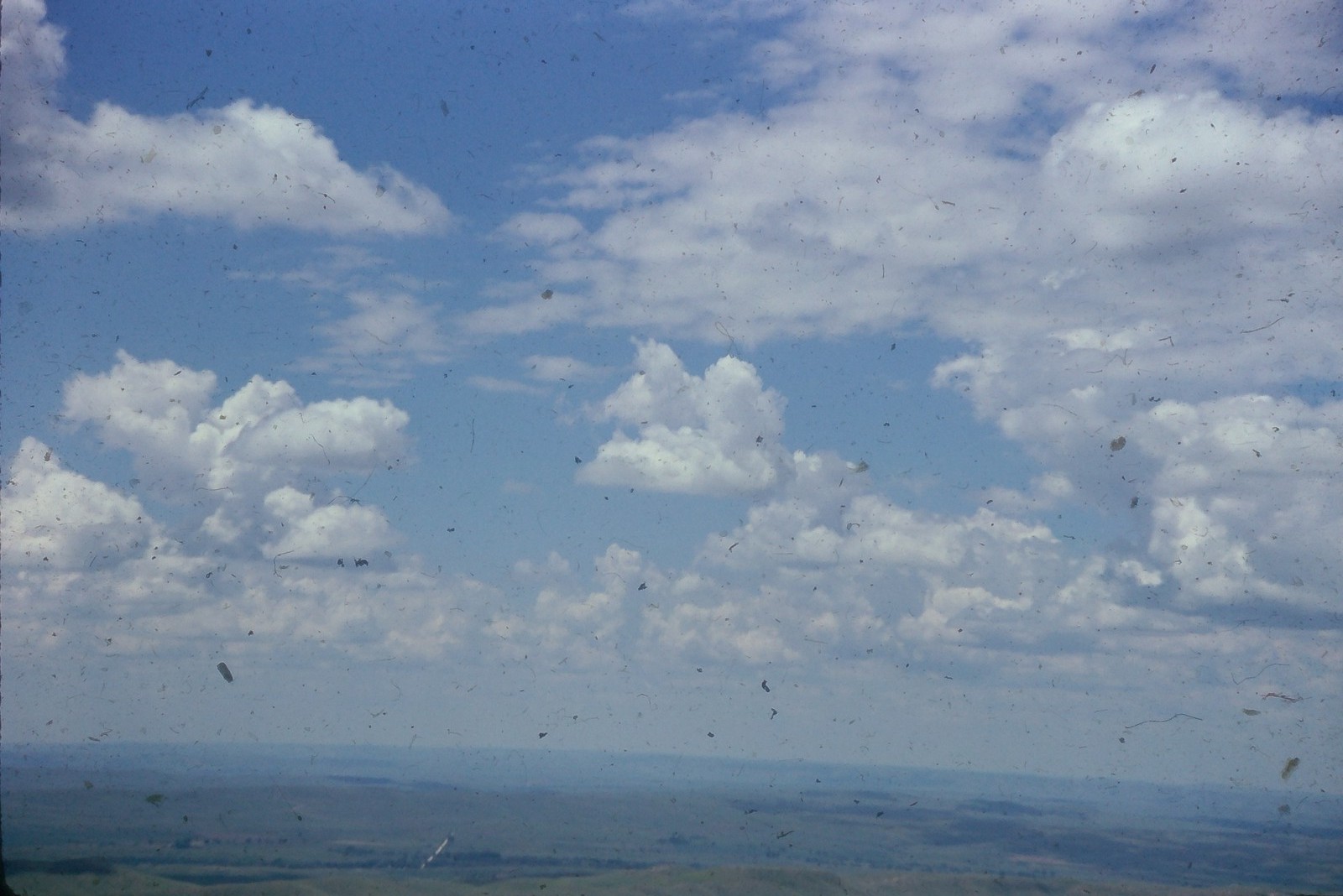 c1960\'s Kodachrome 35mm Slide, Blue Sky White Clouds Distant Landscape View c1960\'s Kodachrome 35mm Slide, Blue Sky White Clouds Distant Landscape View