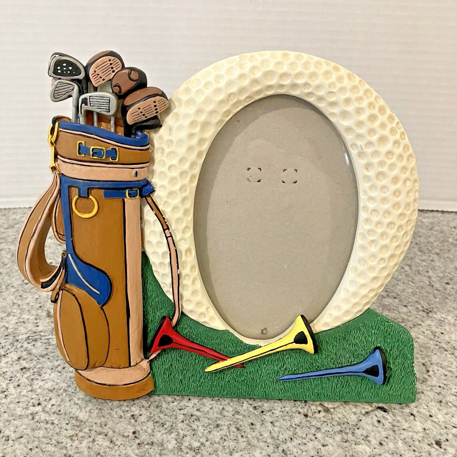 Fetco Golf Themed Ceramic Oval Frame w/Tees and Golf Clubs Holds 4x6 Picture Fetco Golf Themed Ceramic Oval Frame w/Tees and Golf Clubs Holds 4x6 Picture