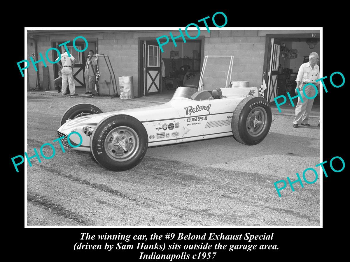 OLD LARGE HISTORIC PHOTO OF SAM HANKS 1957 INDIANAPOLIS RACE CAR BELOND EXHAUST