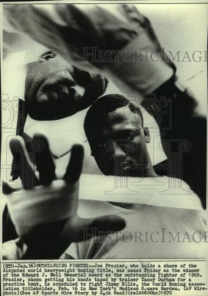 1970 Press Photo Joe Frazier Gets Hands Taped by Yancy Durham for Practice 1970 Press Photo Joe Frazier Gets Hands Taped by Yancy Durham for Practice