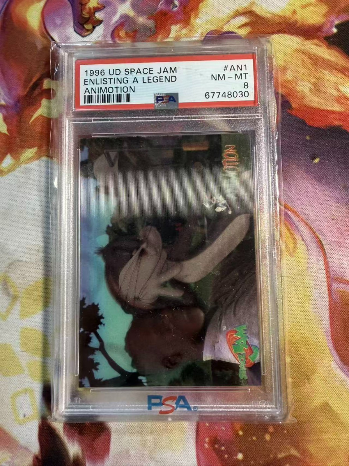 1996 UPPER DECK U.D. SPACE JAM ANIMOTION #AN1 ENLISTING A LEGEND ANIMOTION PSA 8 1996 UPPER DECK U.D. SPACE JAM ANIMOTION #AN1 ENLISTING A LEGEND ANIMOTION PSA 8