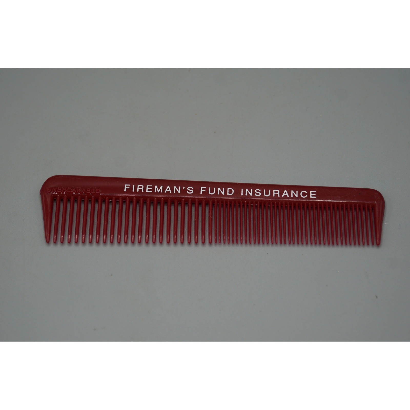 Vintage Fireman\'s Fund Insurance Advertising Pocket Comb Unbreakable Maroon 5in