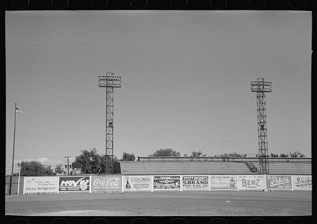 Photo:Signs and lighting standards at baseball park, Saint Paul, Minnesota
