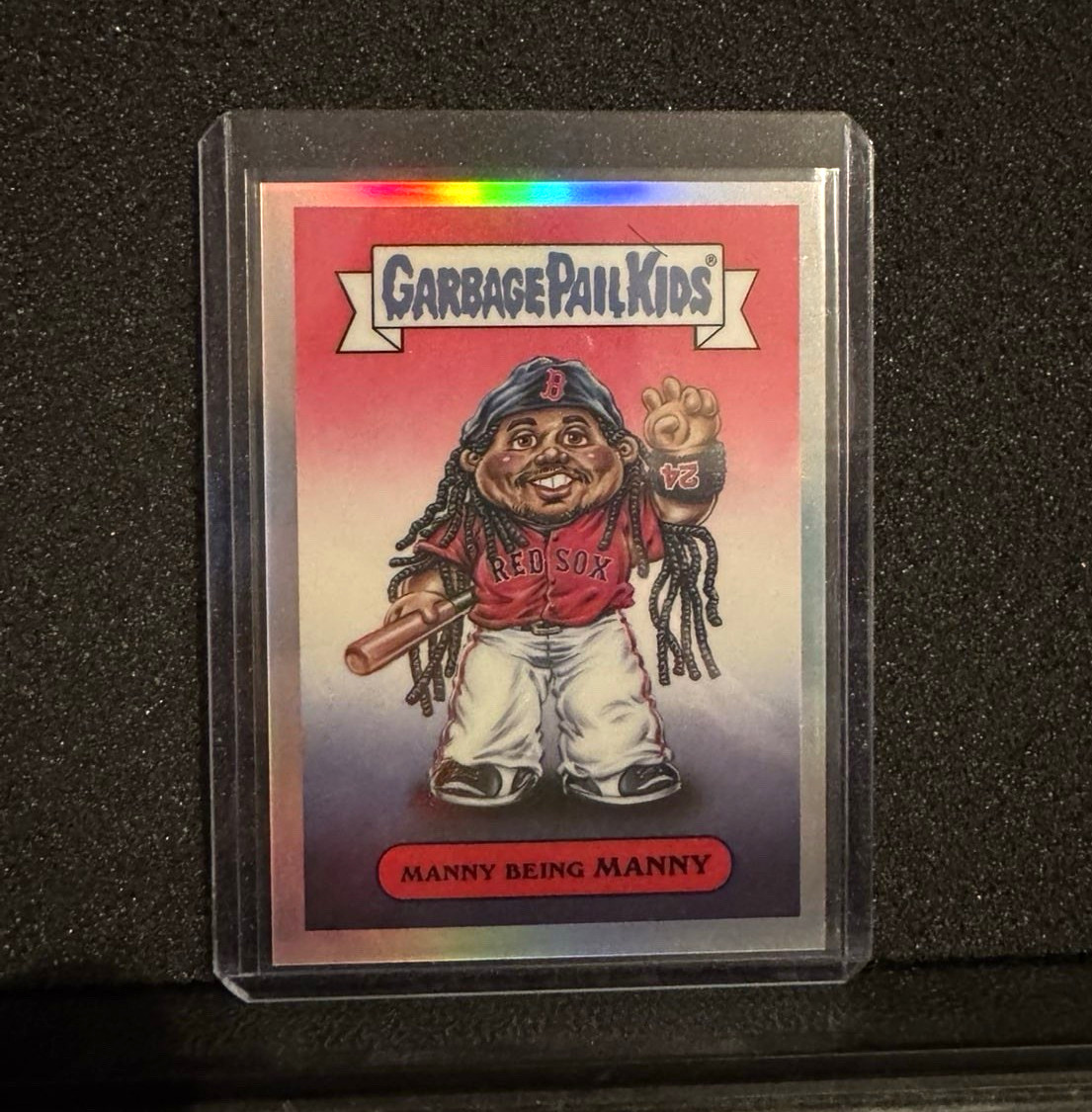 Topps 2026 Garbage Pail Kids Manny Being Manny GPK-27 Manny Ramirez Hologram Topps 2026 Garbage Pail Kids Manny Being Manny GPK-27 Manny Ramirez Hologram