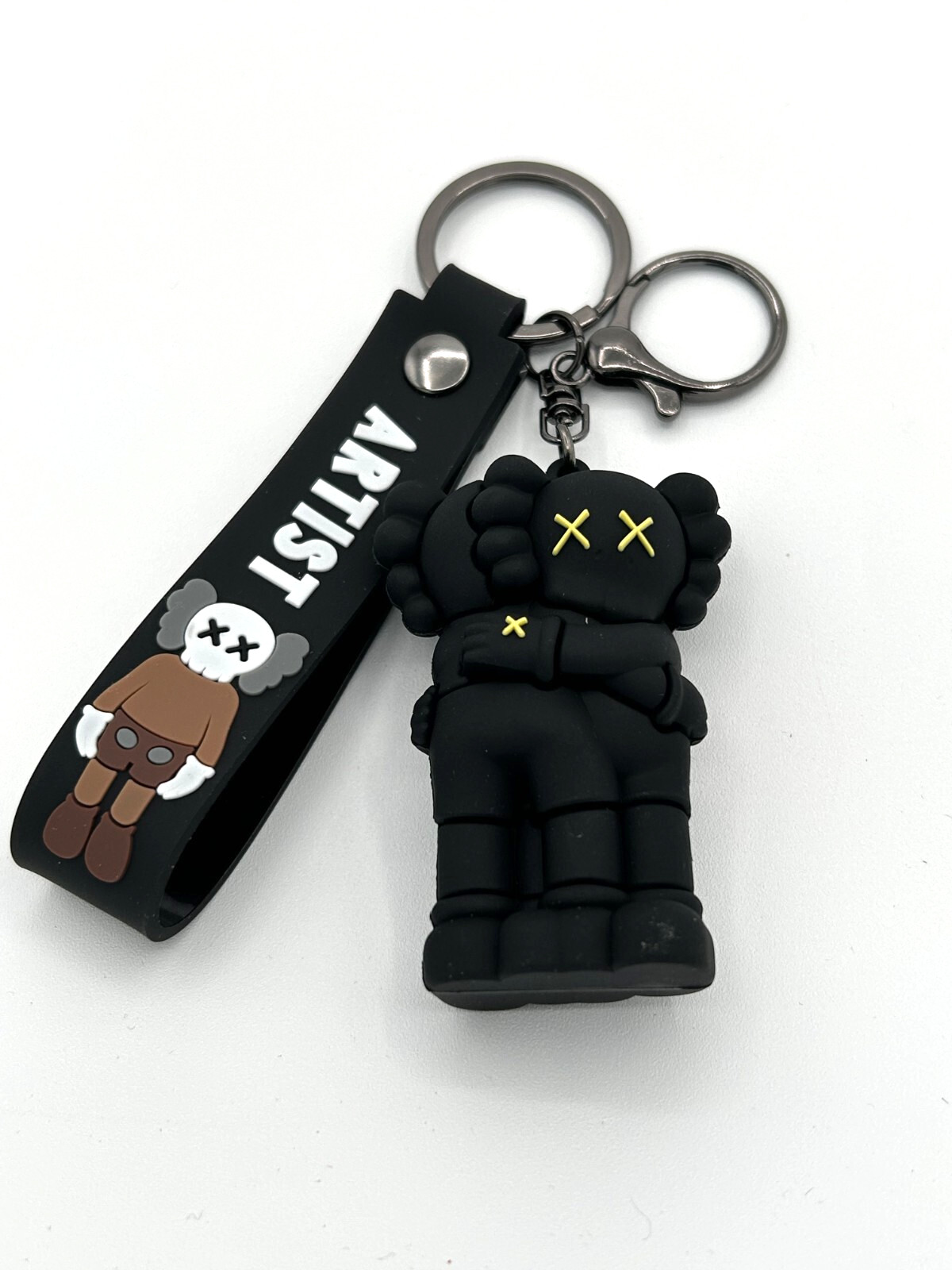 3D KAWS Keychain (Black Hugging) Figure Keyring and Hand Strap Bag Charm Pendant 3D KAWS Keychain (Black Hugging) Figure Keyring and Hand Strap Bag Charm Pendant