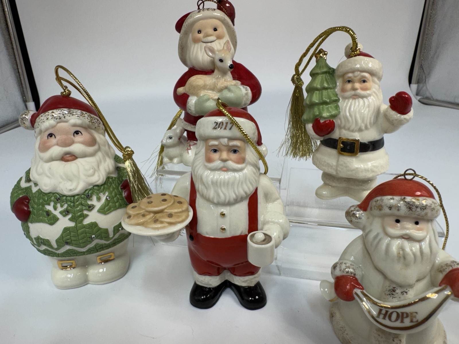 5 Lenox Santa Ornaments, 4” Tall, Porcelain, One Lights Up. 5 Lenox Santa Ornaments, 4” Tall, Porcelain, One Lights Up.