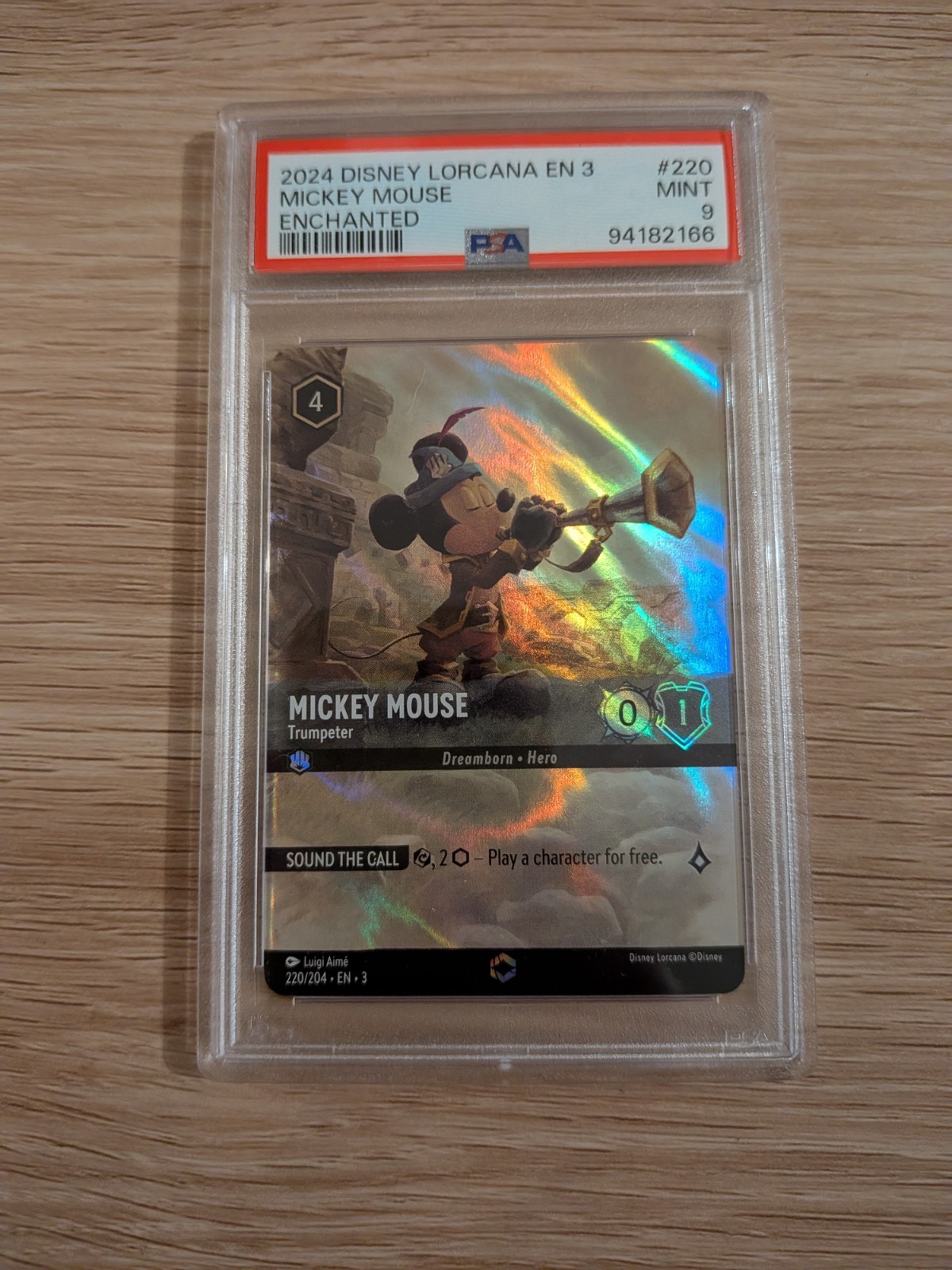 PSA 9 Disney Lorcana Enchanted Mickey Mouse - Trumpeter #220 PSA 9 Disney Lorcana Enchanted Mickey Mouse - Trumpeter #220