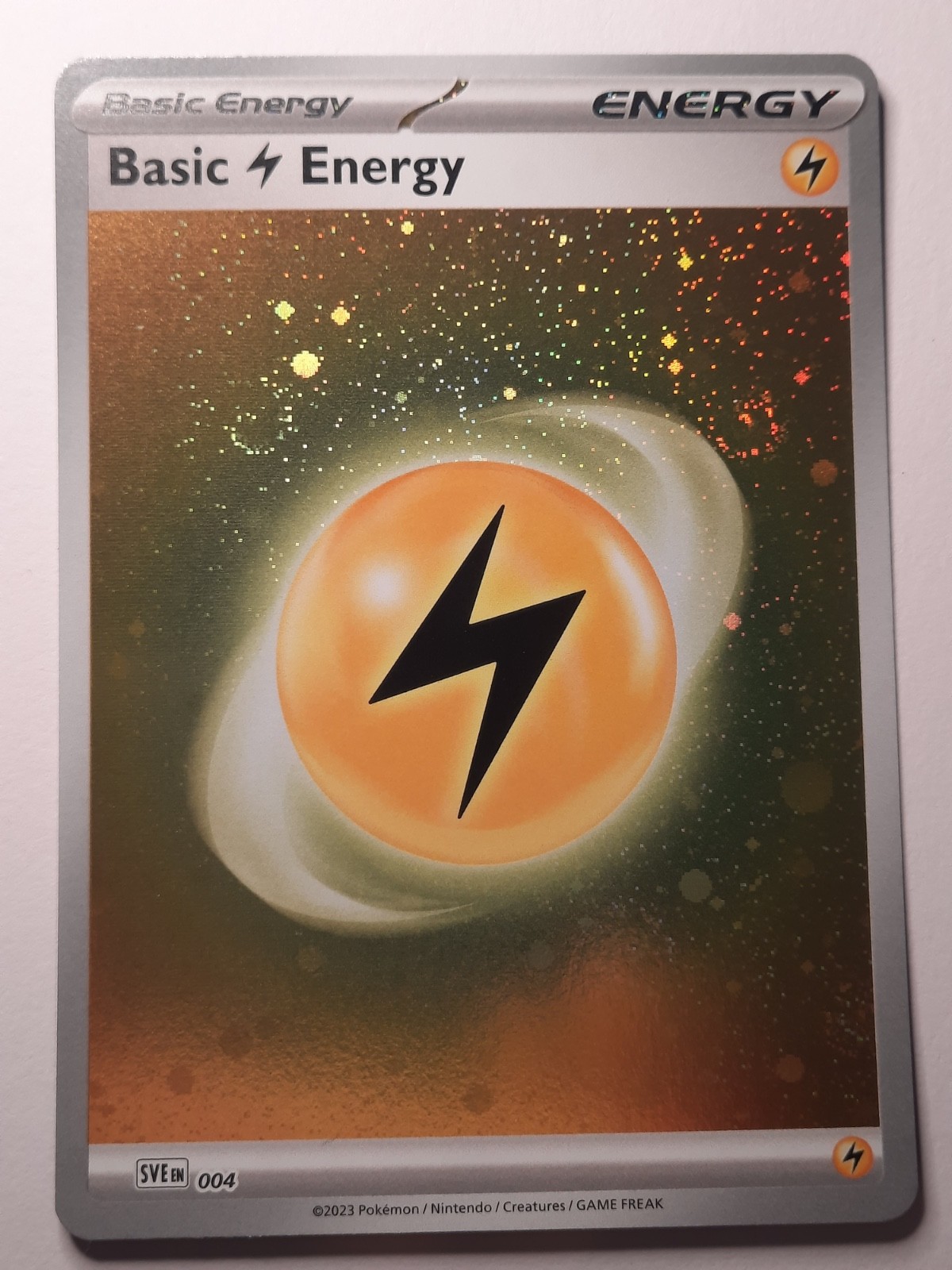 Basic Electric Energy Cosmic Holo SWIRL SVE 004 Pokemon 151 NM