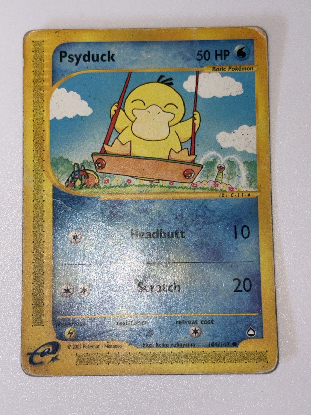 2003 Pokemon Psyduck 104/147 Aquapolis e-Reader WOTC Non-Holo 