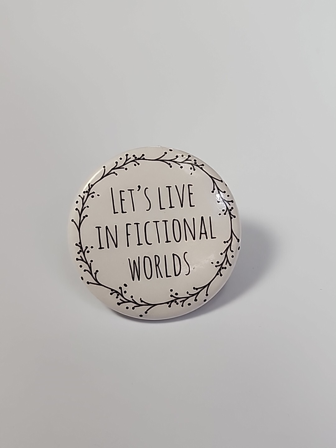 Let\'s Live in Fictional Worlds Button Pin Black & White 1.5\