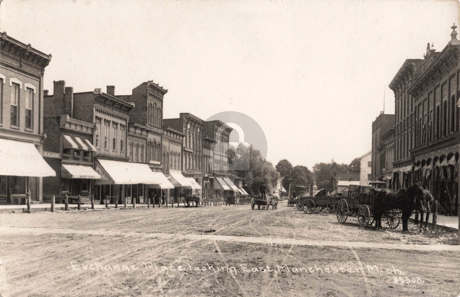 Street View Exchange Place Looking East, Manchester MI 1916 RPPC Postcard COPY Street View Exchange Place Looking East, Manchester MI 1916 RPPC Postcard COPY
