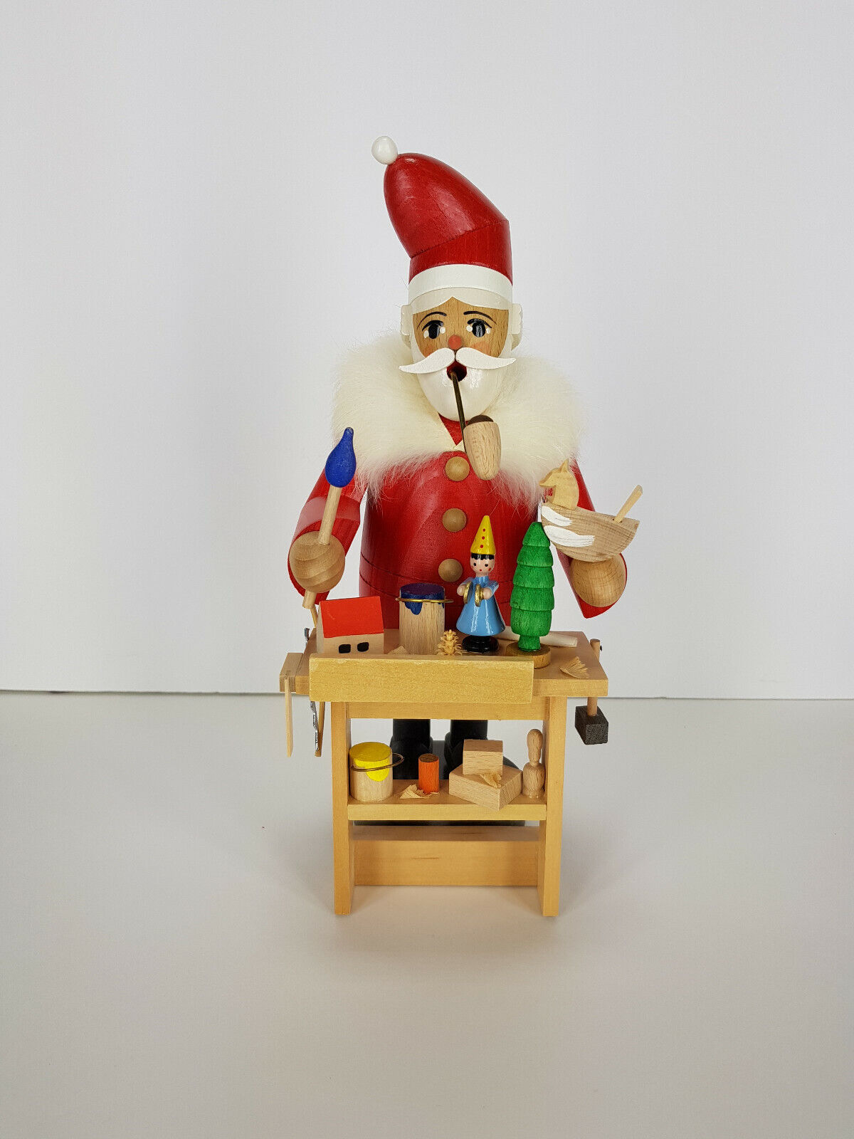 Santa At Workbench Smoking Man