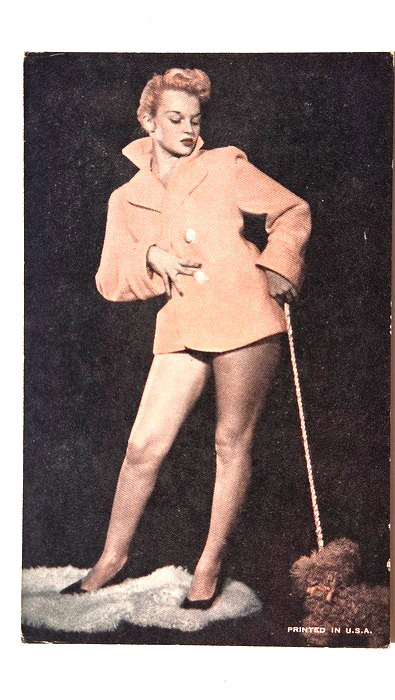 1940\'s Burlesque Pinup Girl in Orange Coat Walking Her Dog Exhibit Supply Co.