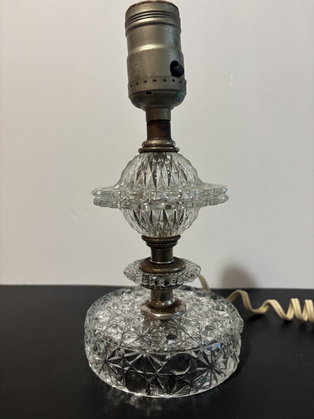 vintage 1940-50's clear cut crystal boudoir/accent table lamp. No shade. Works.
