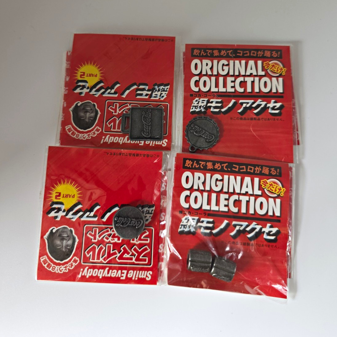 Vintage Coca Cola Japan  Sealed Smile Present Part  Metal Mini Accessories Lot 4